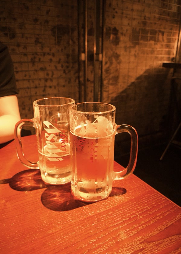 Two glasses resting in late warm light